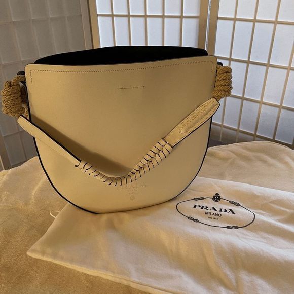 Prada Handbags - **AUTHENTIC** Prada leather Hobo Bag with cord/rope detail on handles